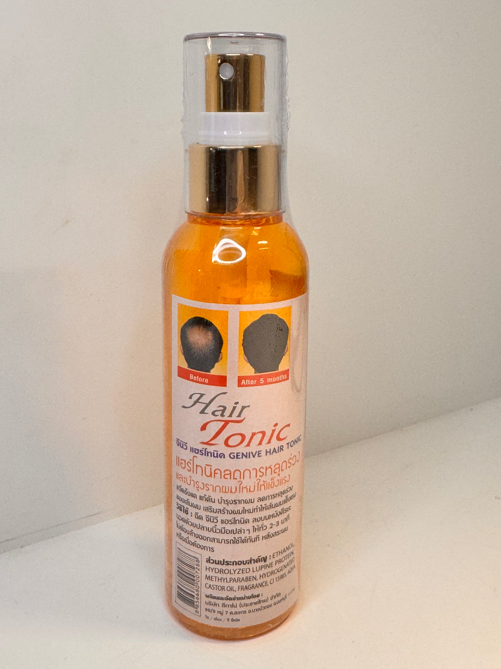 Genive hair tonic with natural extracts for thicker hair