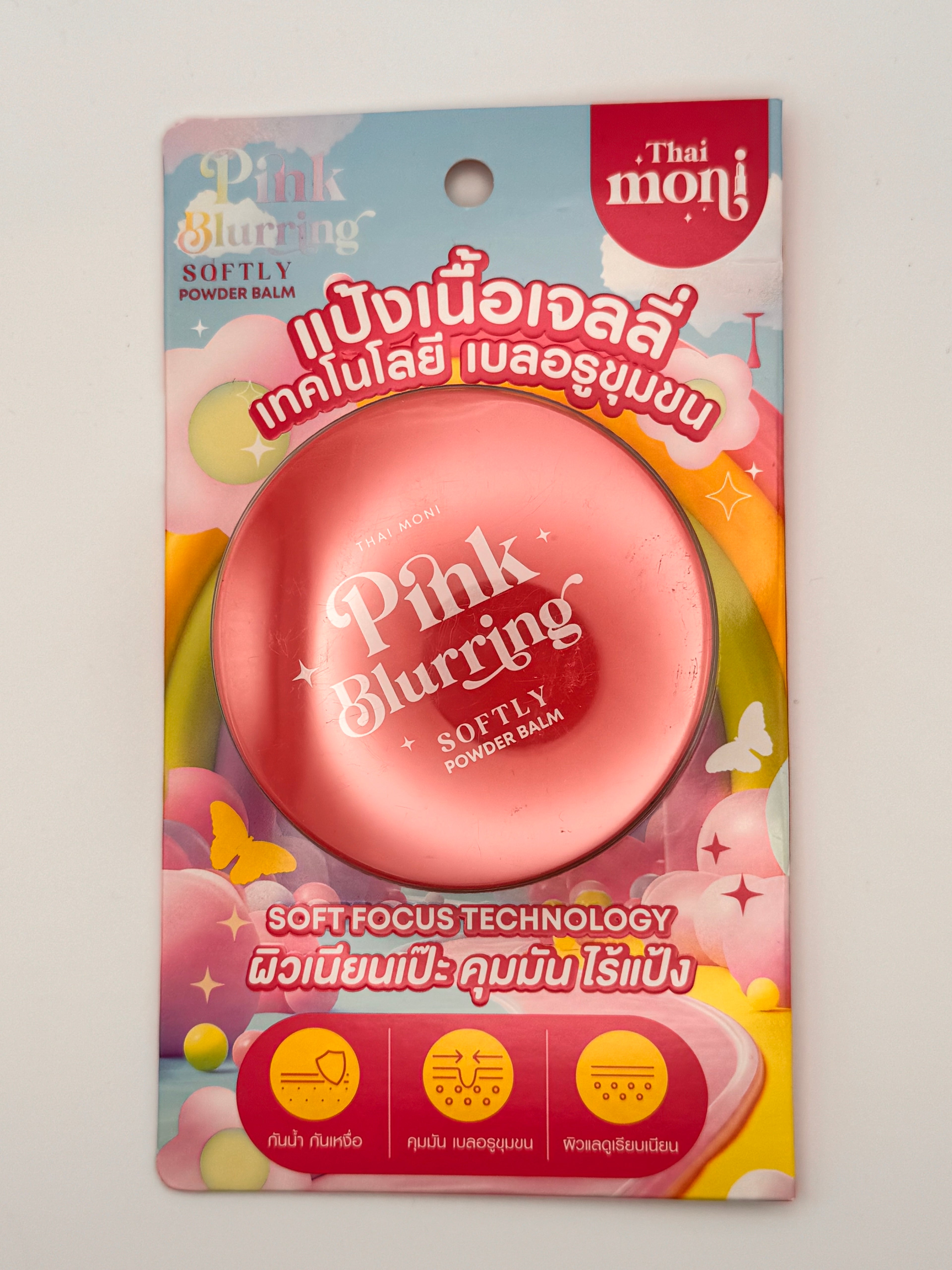 "Thai Moni Pink Blurring Powder Balm - Thai hybrid powder balm that blurs pores and sets makeup with a soft pink radiance and flawless finish"
