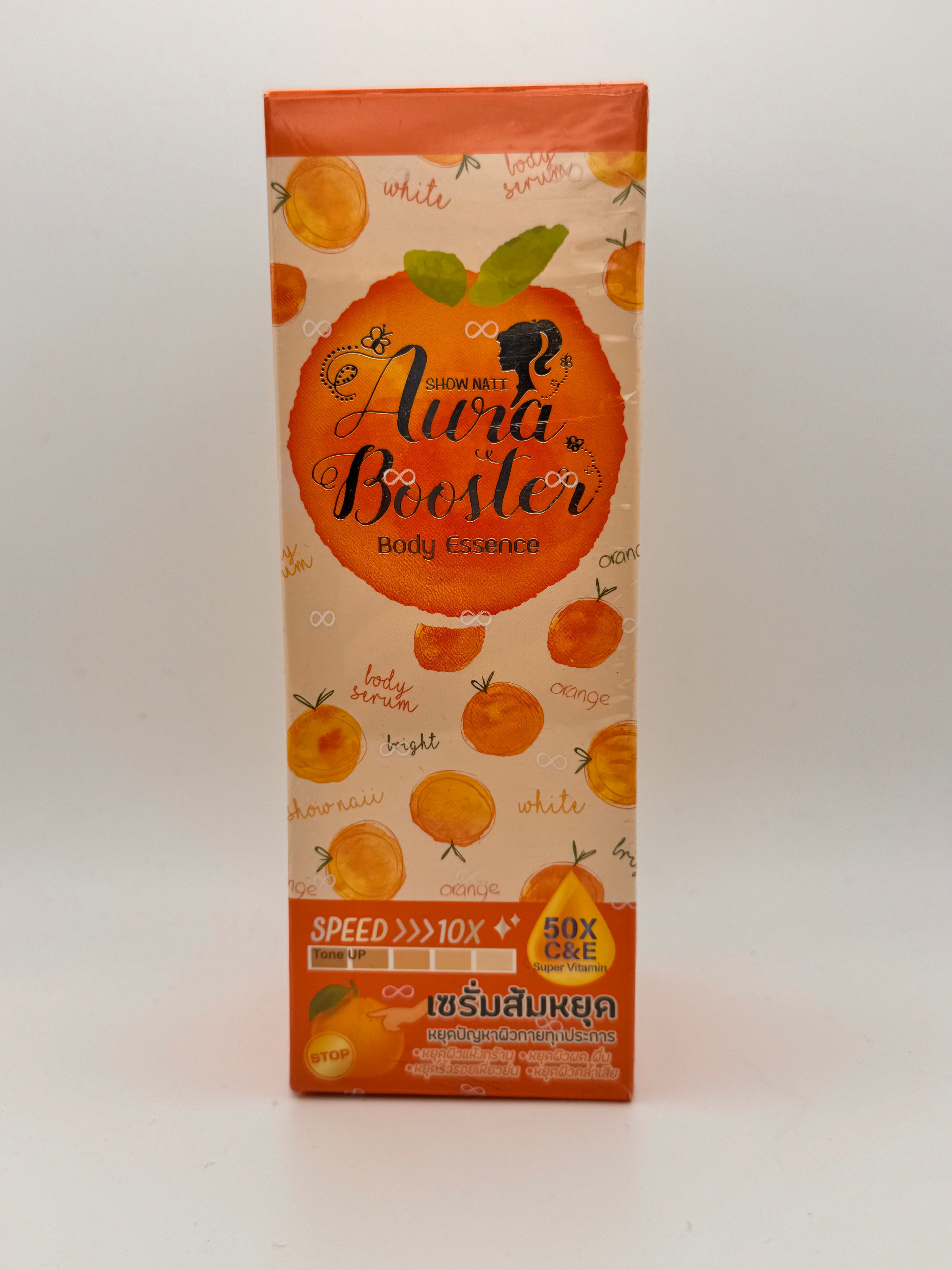 "Aura Booster Body Essence box front showing Thai brightening body serum with niacinamide and vitamin C for luminous aura glow"
