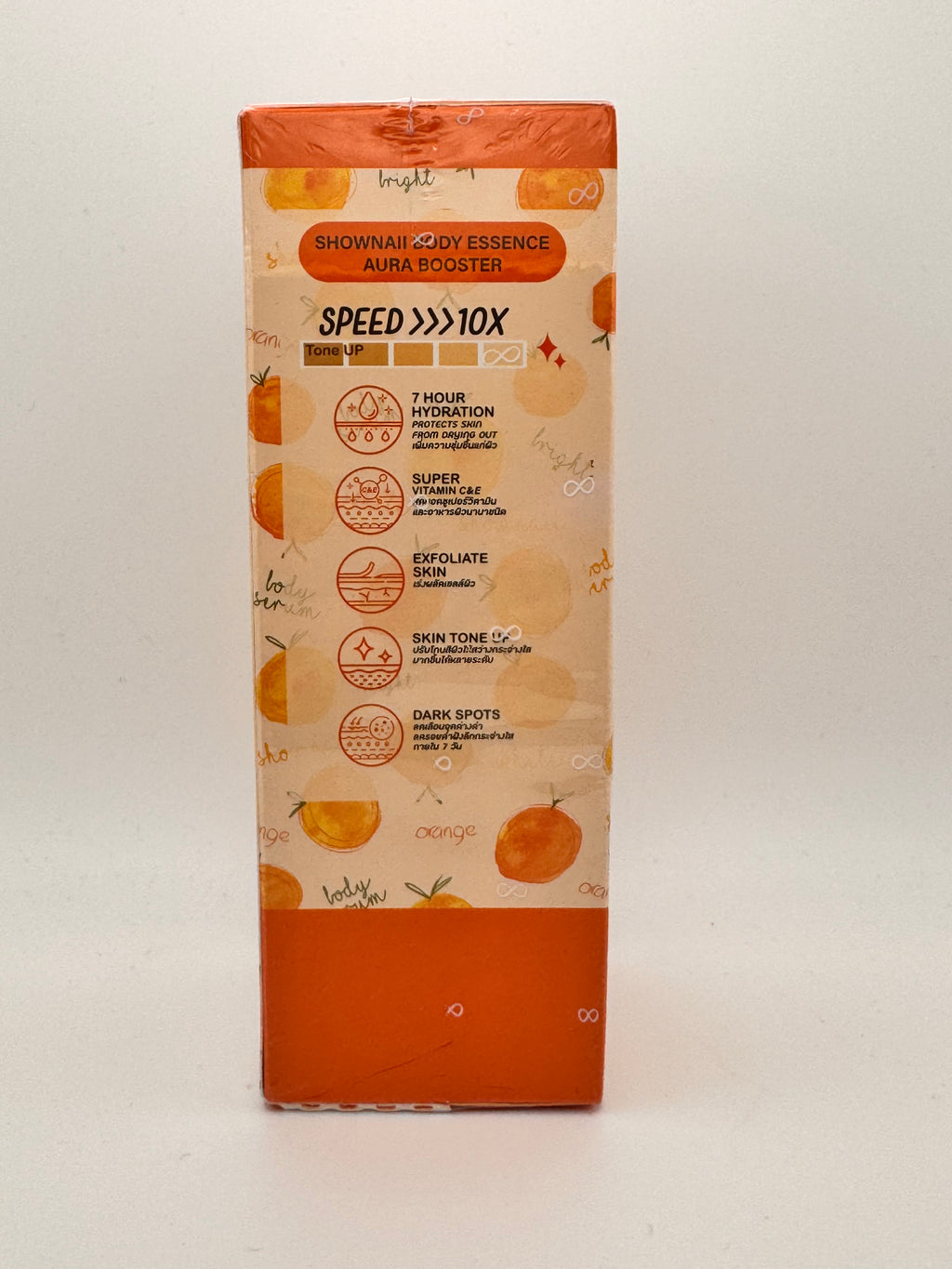 "Aura Booster Body Essence box side panel showing key ingredients and product details"
