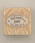 "Jam Rice Milk Soap bars unwrapped showing creamy rice milk texture for brightening face and body"
